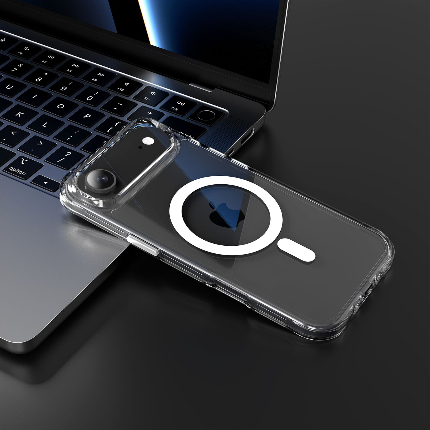 Eine transparente Handyhülle mit weißem Kreisdesign und eine Laptop-Tastatur auf schwarzem Untergrund.