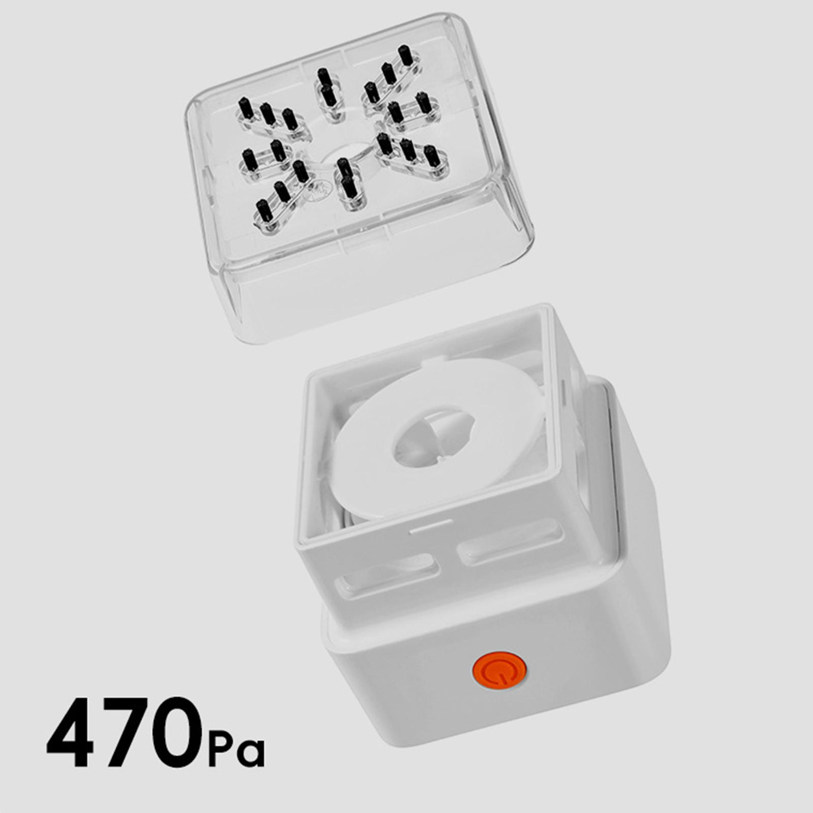 Weißes Gerät mit transparentem Deckel. Enthält schwarze Komponenten. Orangefarbene Taste vorne. Liest 470Pa.