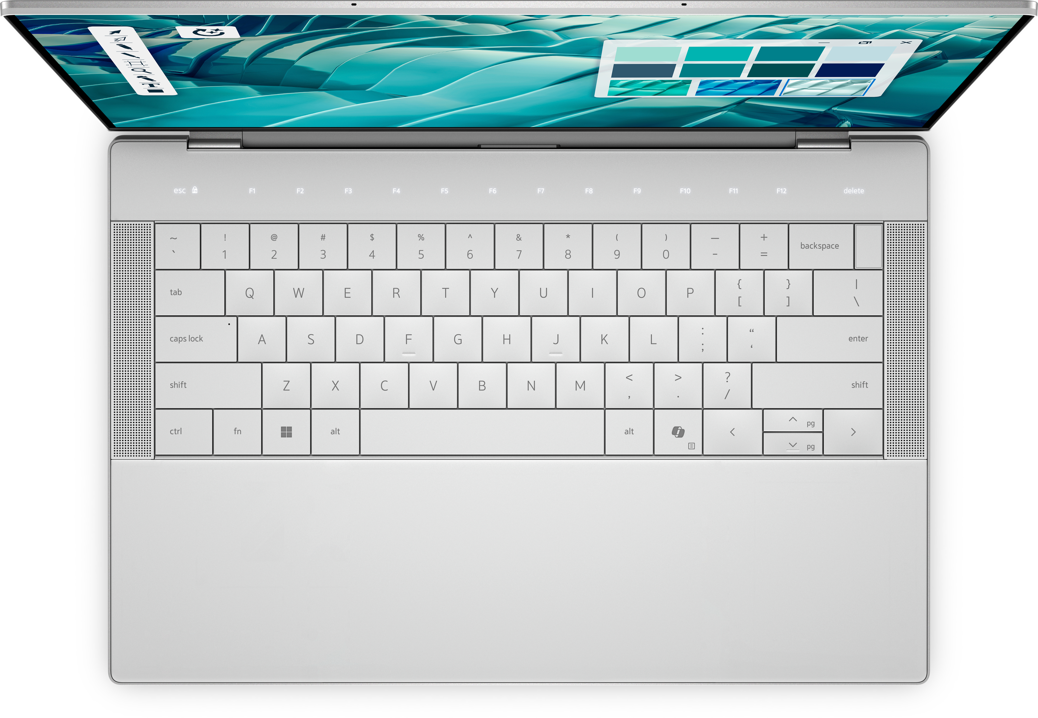 Un laptop argentato, tastiera visibile, schermo con design astratto turchese e tavolozza colori.
