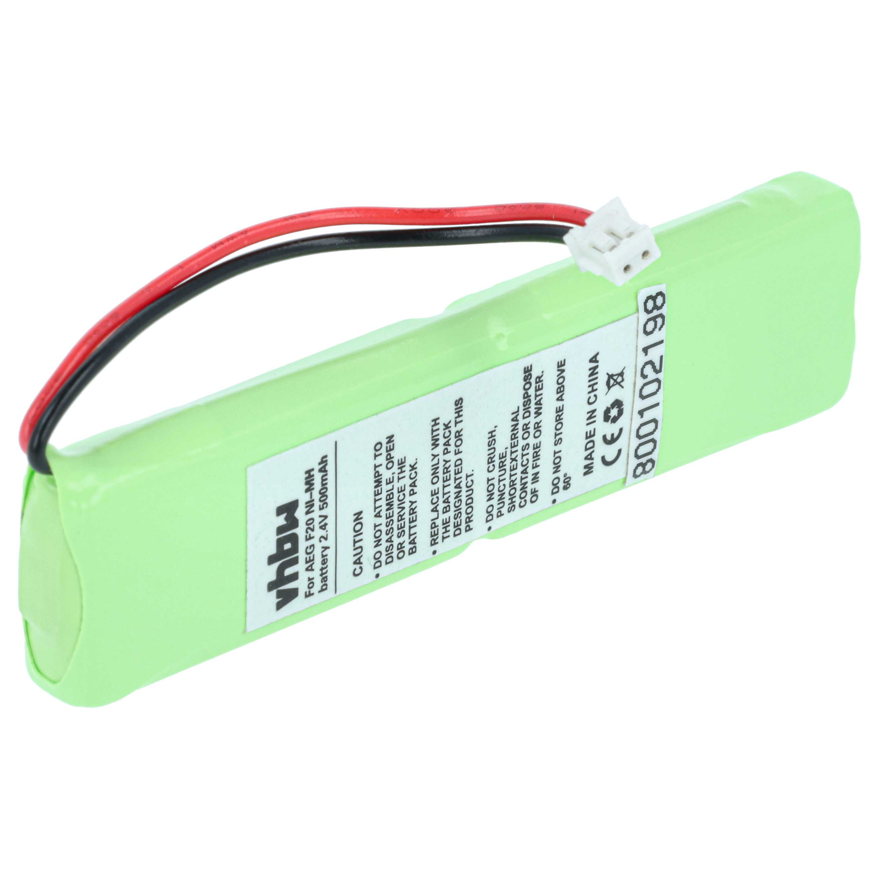 Ein grüner Akku mit schwarzen und roten Drähten und einem weißen Stecker. Text auf dem Akku.
