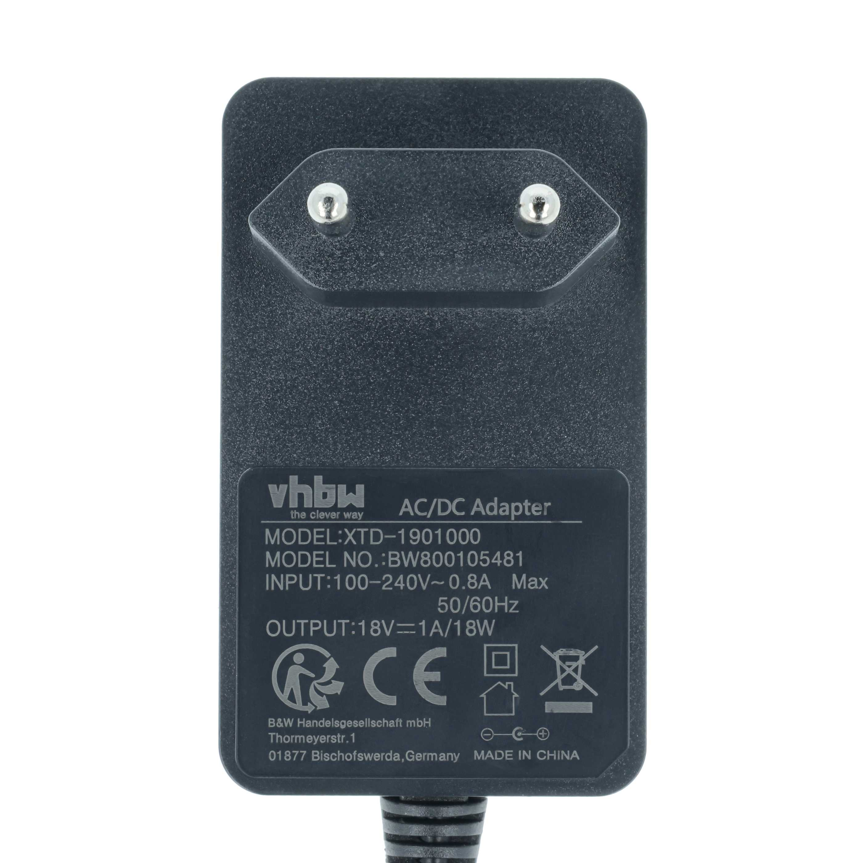 Dunkelgrauer AC/DC-Adapter mit Stecker. Text enthält Modell- und Leistungsinformationen. Hergestellt in China.
