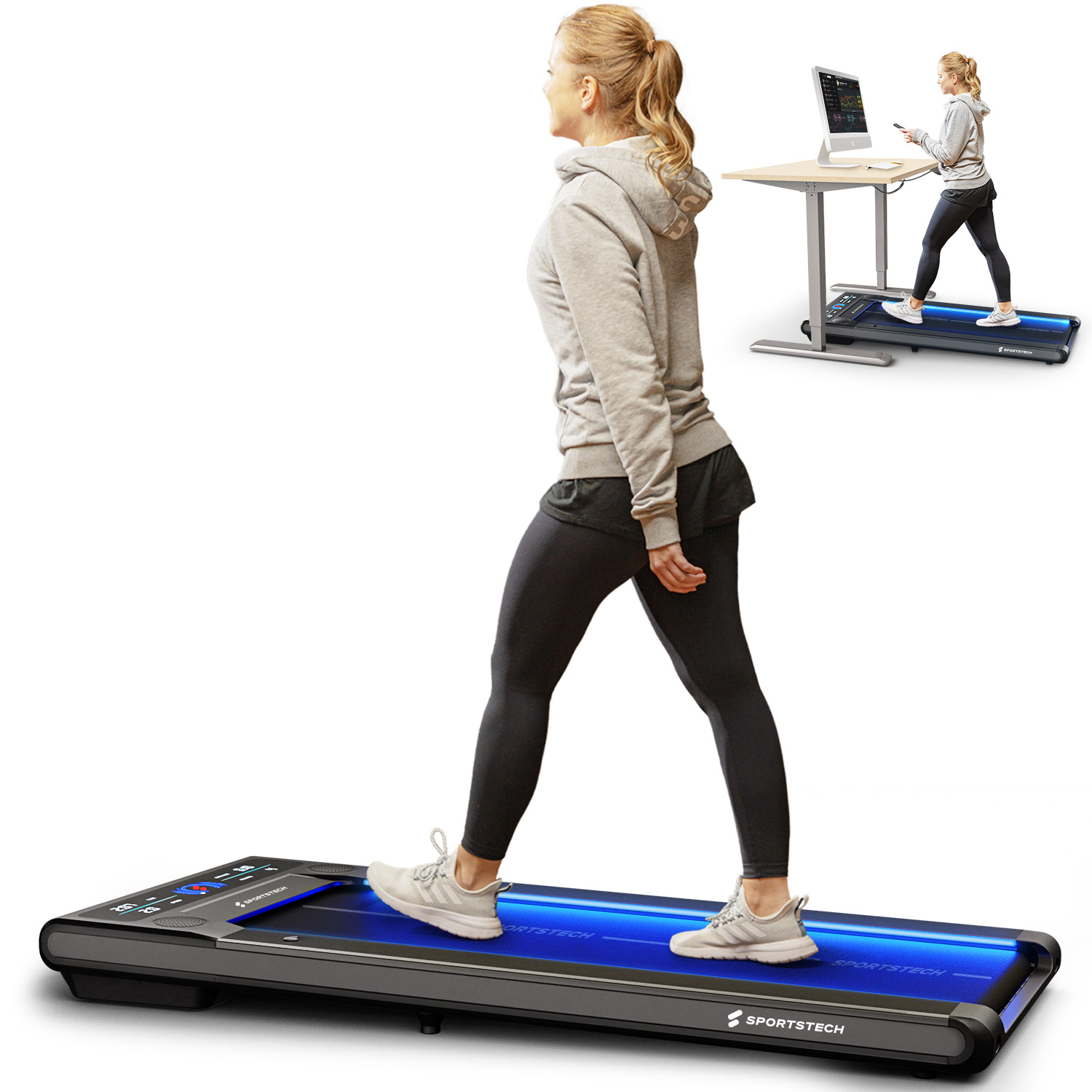Eine Frau geht auf einem Laufband. Das Laufband steht auf dem Boden. Im Hintergrund befinden sich ein Schreibtisch und ein Monitor, an dem eine Frau arbeitet.