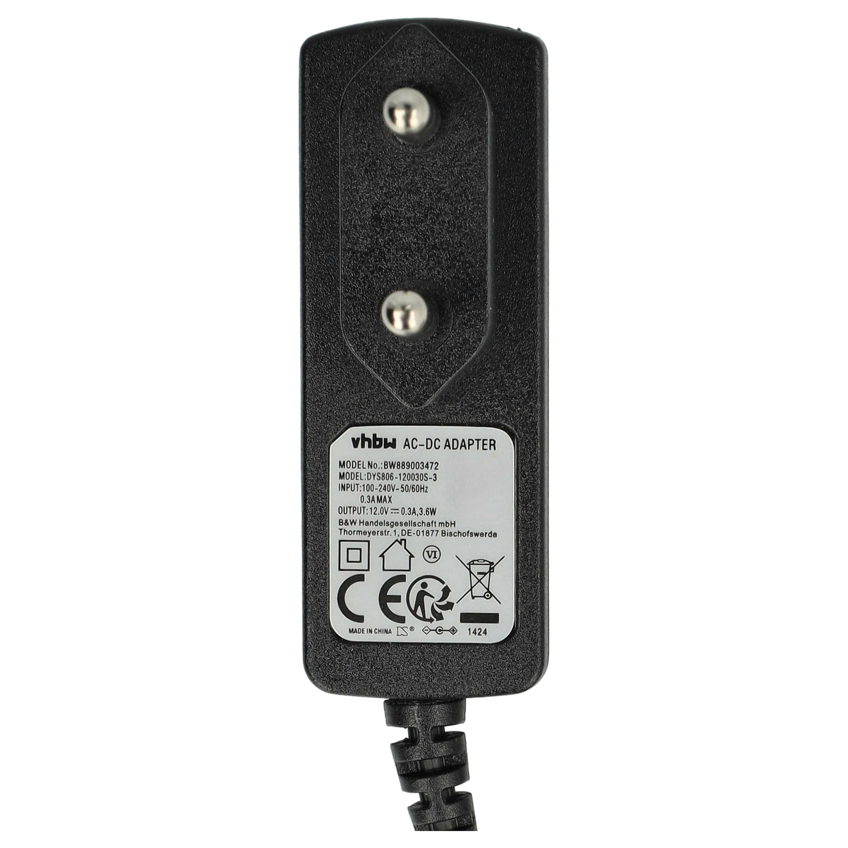 Ein schwarzes AC-DC-Netzteil mit weißem Text. Es hat zwei Stifte und ein Etikett mit technischen Daten.