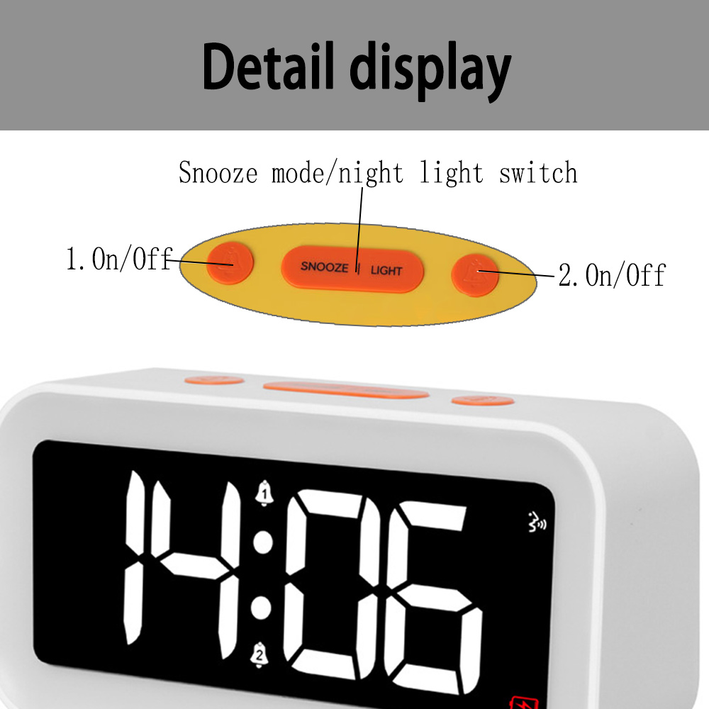 Weißer digitaler Wecker zeigt 14:06. Orangefarbene Tasten oben und ein gelber Bereich mit den Aufschriften 'Snooze' und 'Light'. Text: Detailanzeige.