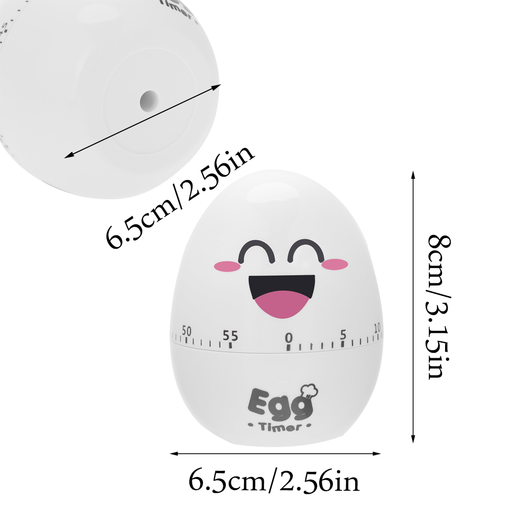 Weißer eiförmiger Timer mit lächelndem Gesicht. Zeigt Maße in cm und Zoll an. Der Timer zeigt das Wort 'Egg Timer'.