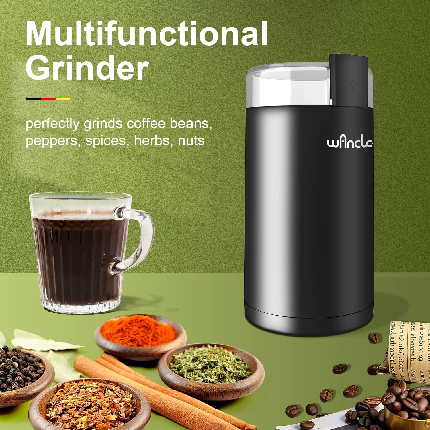 Ein schwarzer Grinder mit durchsichtigem Deckel, eine Kaffeetasse, Gewürze in Schalen und Text: Multifunktions-Grinder.