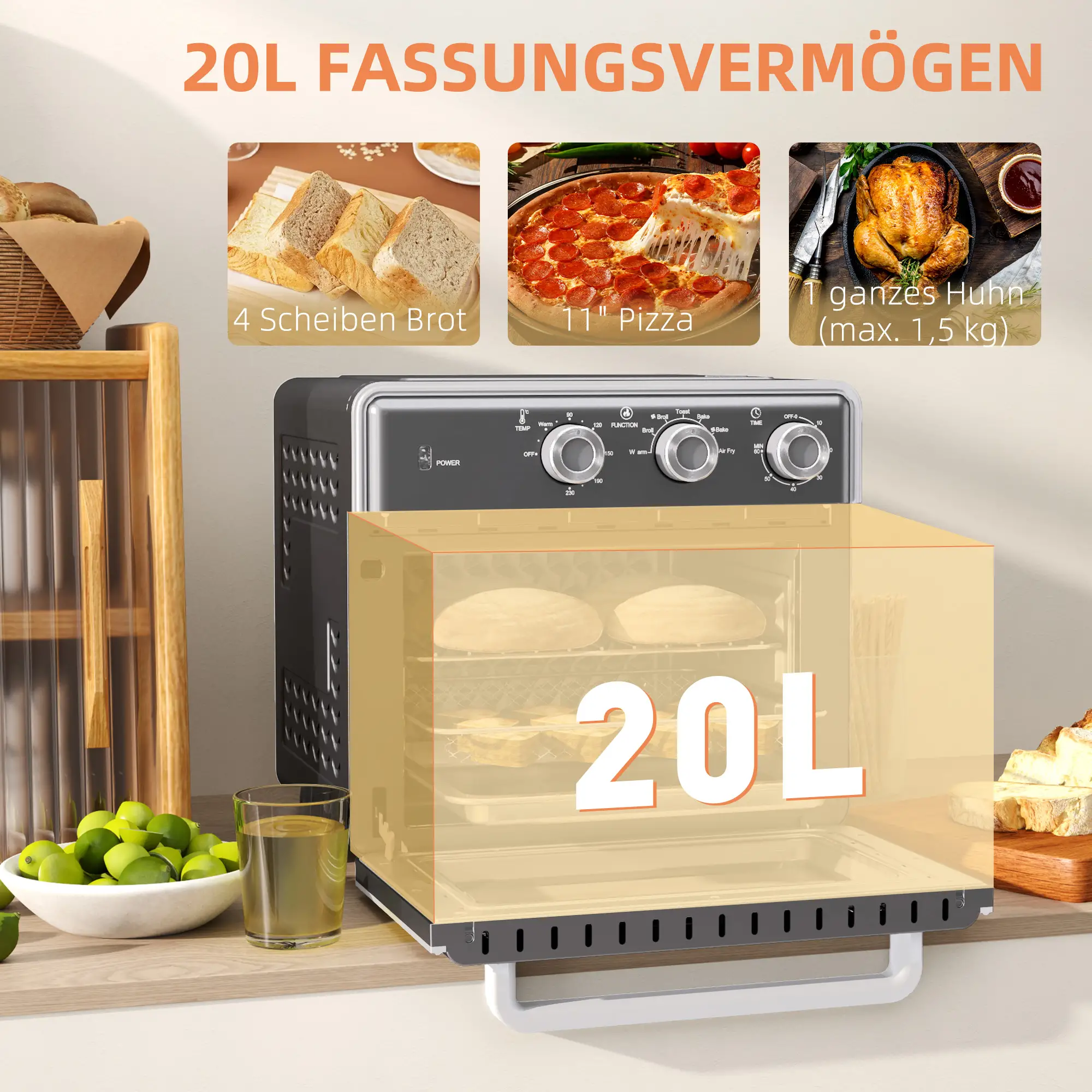 Ein Airfryer mit Lebensmittelproben: Brot, Pizza und Hähnchen. Zitronen und ein Glas stehen auf der Theke.