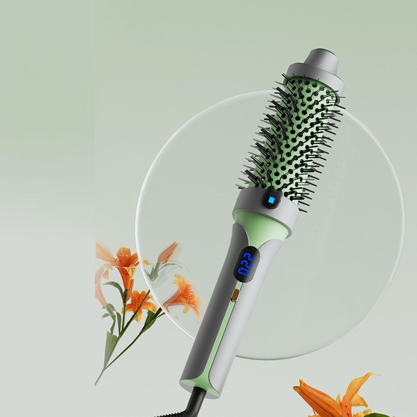 Eine Haarbürste mit Digitalanzeige. Grüner Bürstenkopf mit schwarzen Borsten. Orangefarbene Blumen im Hintergrund.
