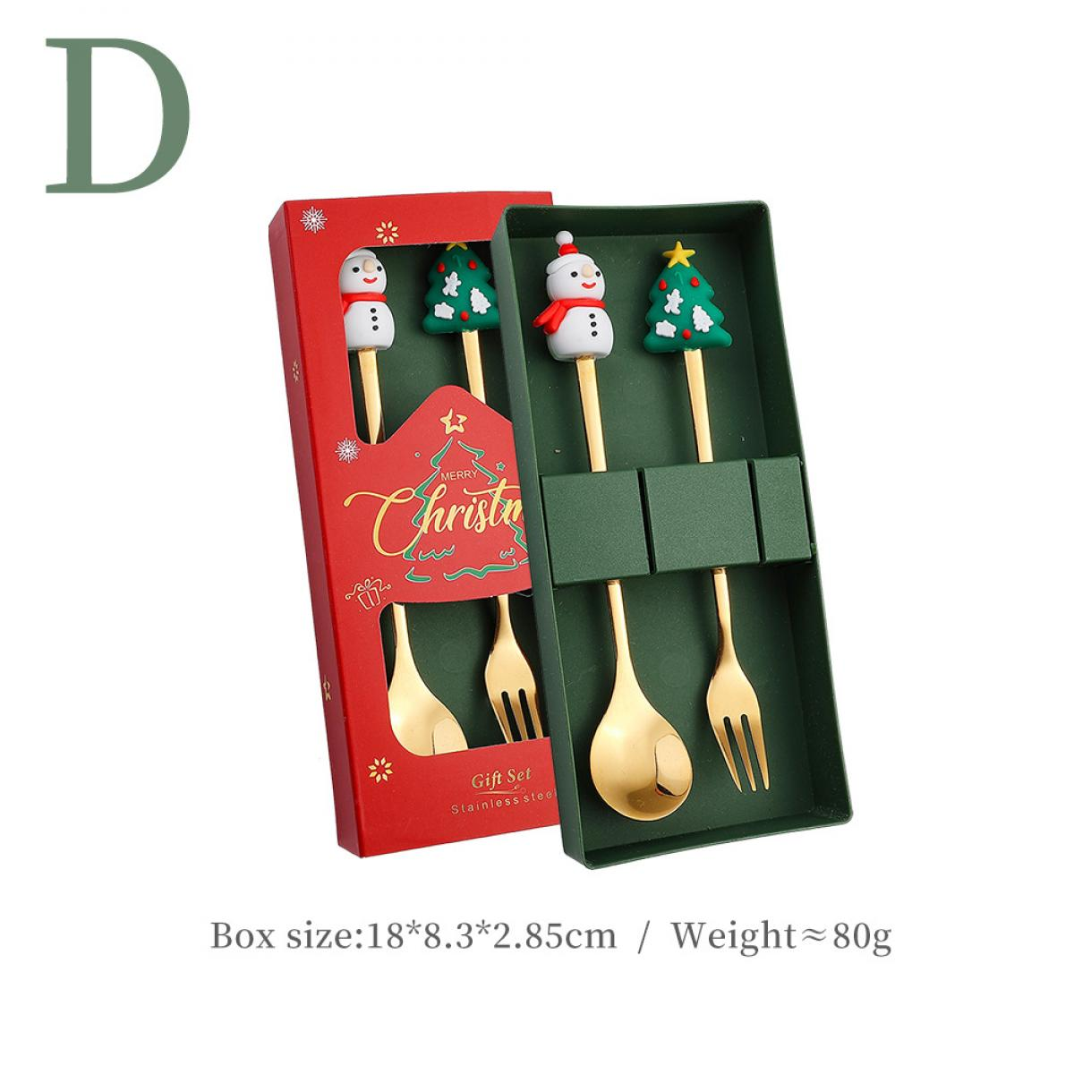Weihnachtsgeschenkset mit Schneemann- und Baumaufsätzen. Enthält goldene Löffel und Gabeln in roten und grünen Boxen.