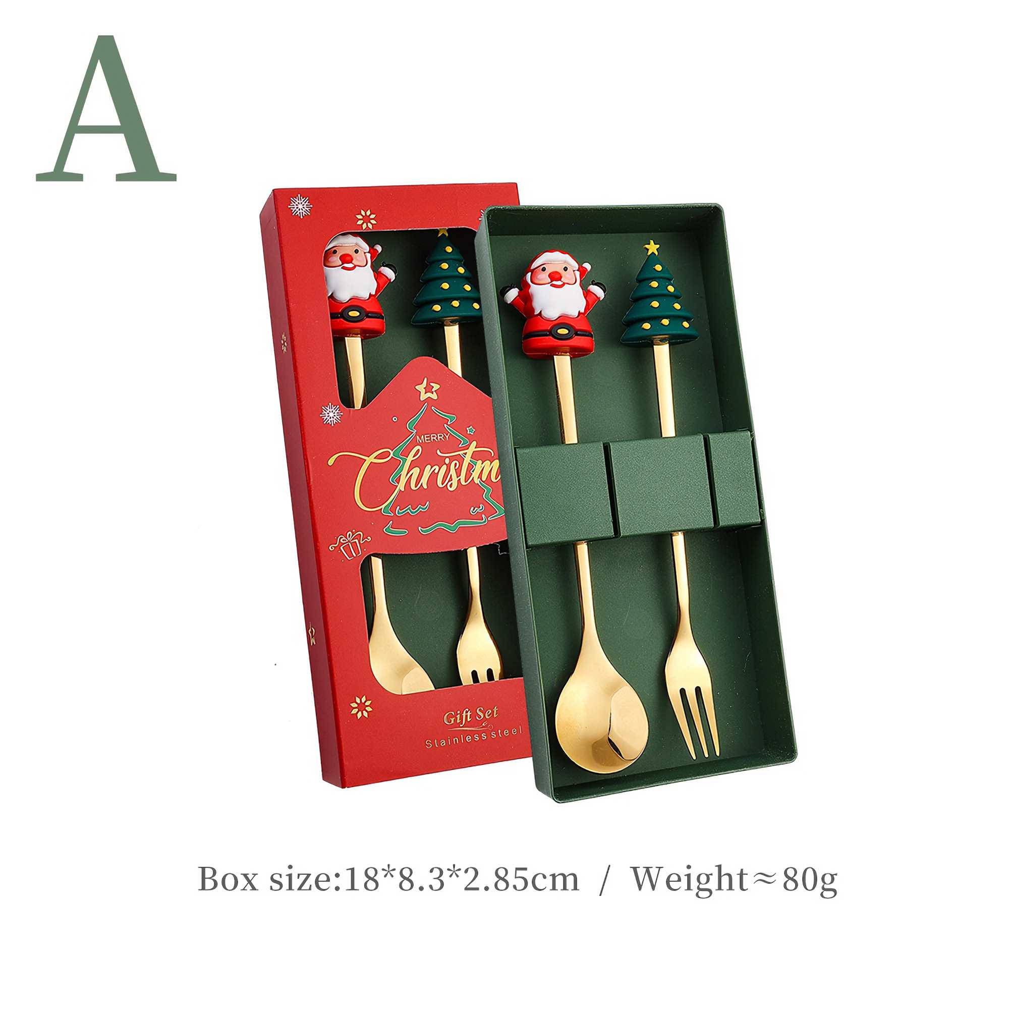 Weihnachtsgeschenkset mit Santa- und Baumaufsätzen. Goldene Utensilien in einer rot-grünen Box. Text: Frohe Weihnachten.