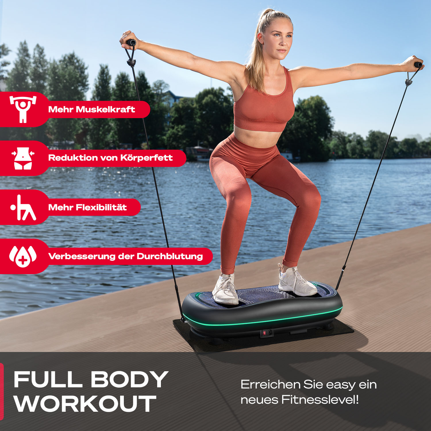 Eine Frau in Sportkleidung trainiert auf einer Vibrationsplattform, hält Widerstandsbänder, mit einem See im Hintergrund.