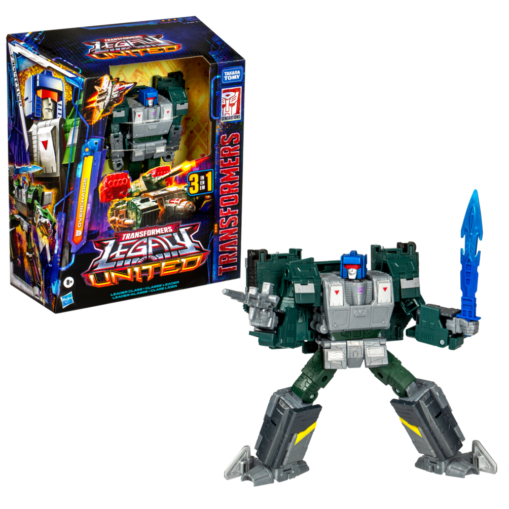 Bir Transformers Legacy United oyuncak figürü, kutusunun yanında duruyor. Figür yeşil, gri ve mavi renkte, mavi bir kılıç tutuyor.