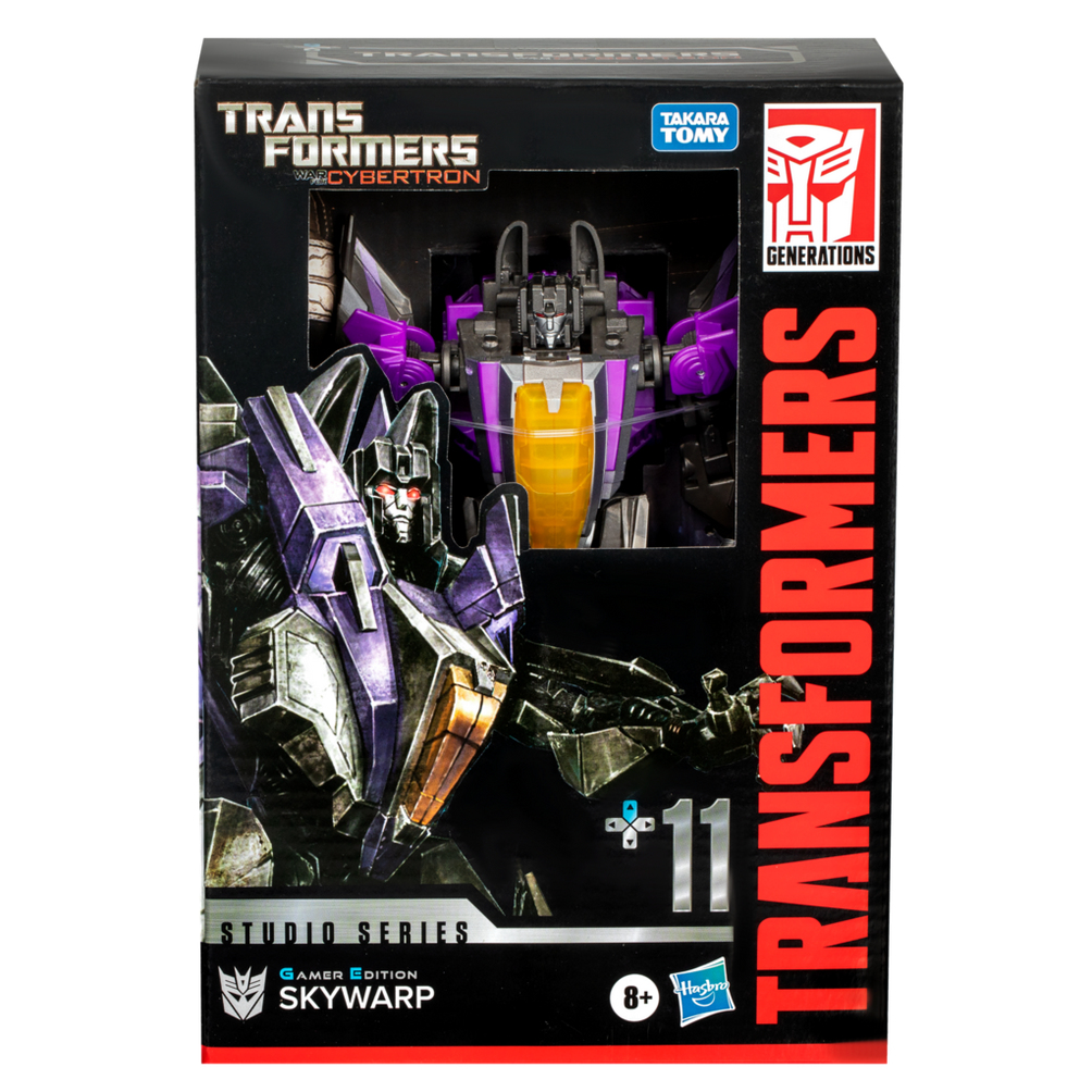 Zabawka Transformers Skywarp w pudełku. Pudełko jest czarne z czerwonym i białym tekstem. Skywarp jest fioletowy, czarny i złoty.