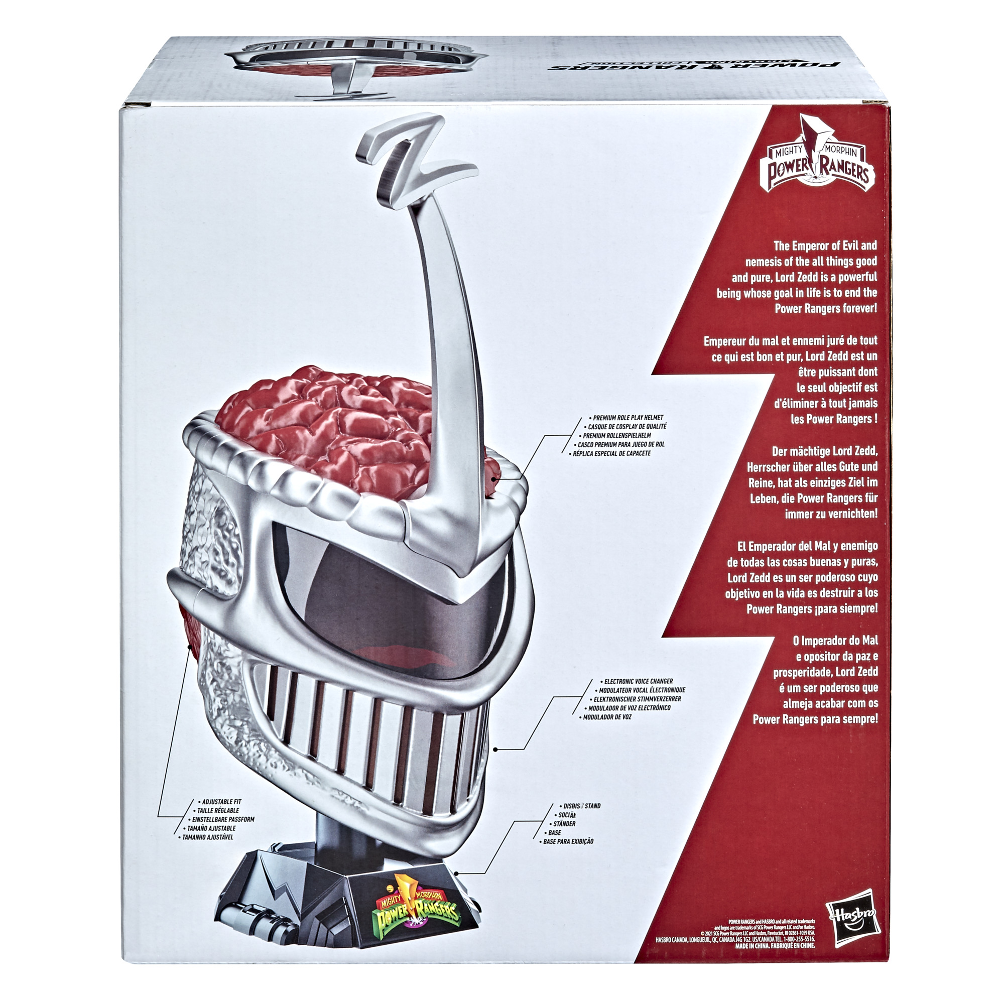 Kutuda bir Lord Zedd kask oyuncağı gösteriliyor. Kırmızı beyin benzeri bir üst kısma ve gümüş bir yüze sahip. İngilizce, İspanyolca ve Fransızca metin.