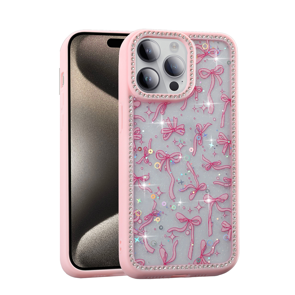 Işıltılı yapay elmaslar ve pembe kurdele desenli pembe telefon kılıfı, bir akıllı telefonu sergiliyor.