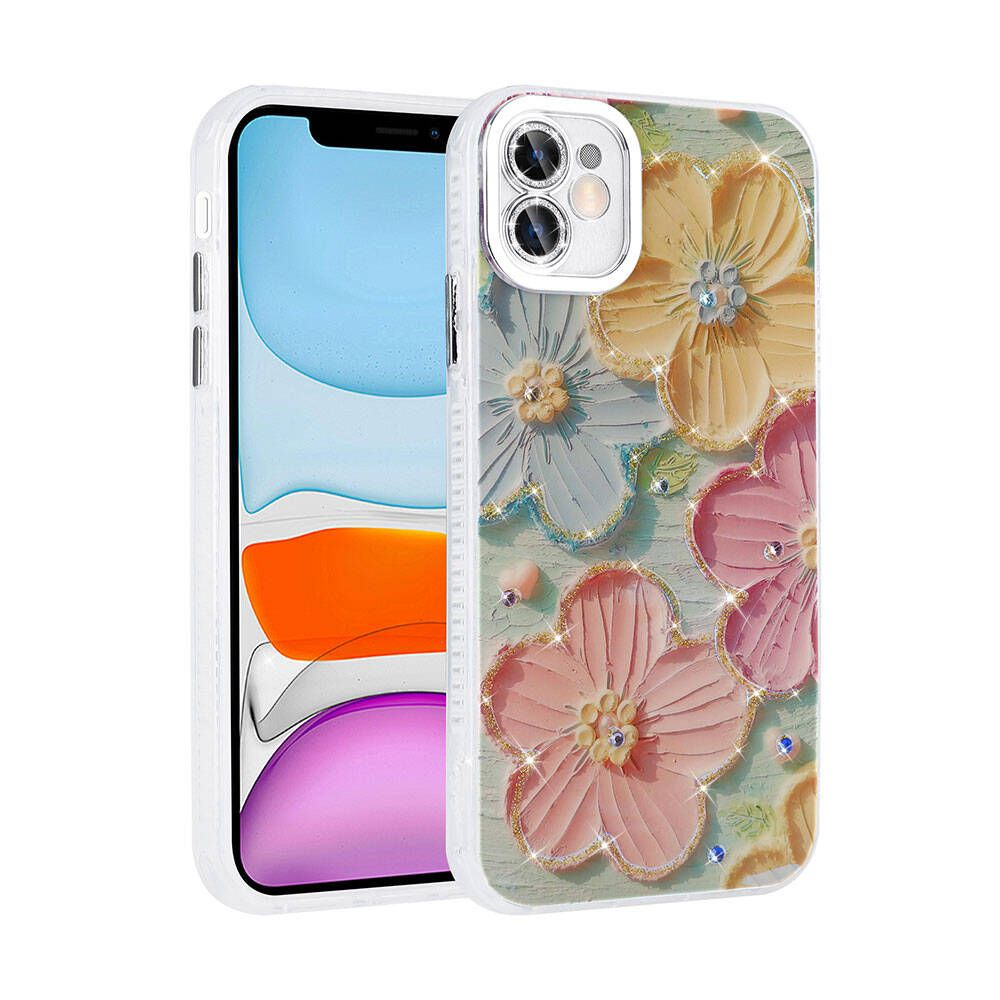 İki telefon. Biri şeffaf kılıf, diğeri çiçek desenli. Açık yeşil zemin üzerinde pembe, sarı ve mavi çiçekler ve mücevherler.