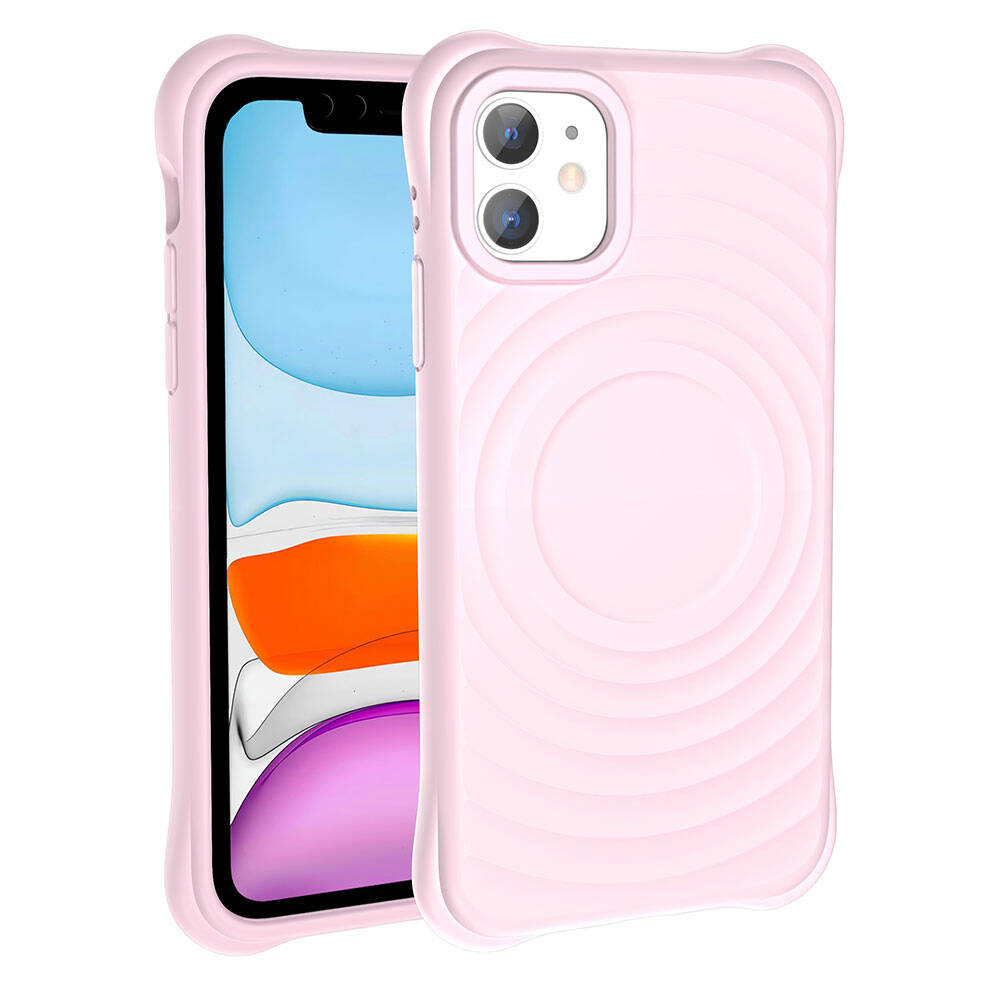 Arka tarafında eş merkezli daireler bulunan pembe telefon kılıfı, siyah ekranlı bir telefonun yanında. Açık pembe renktedir.