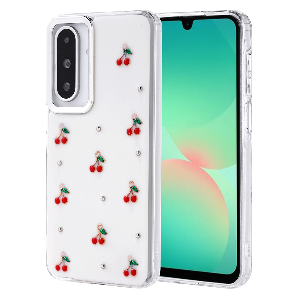 Kiraz desenli ve taşlı beyaz bir telefon kılıfı. Yanında yeşil ekranlı bir telefon var.