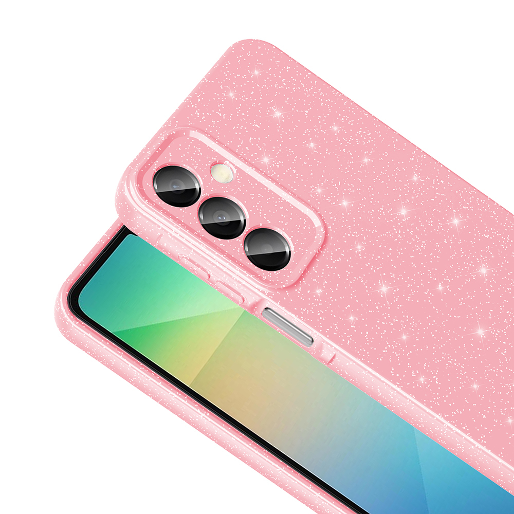 Pembe parıltılı telefon kılıfı. Kamera modülü ve düğmeleri bulunur. Ekran yeşil ve sarı bir geçiş gösteriyor.