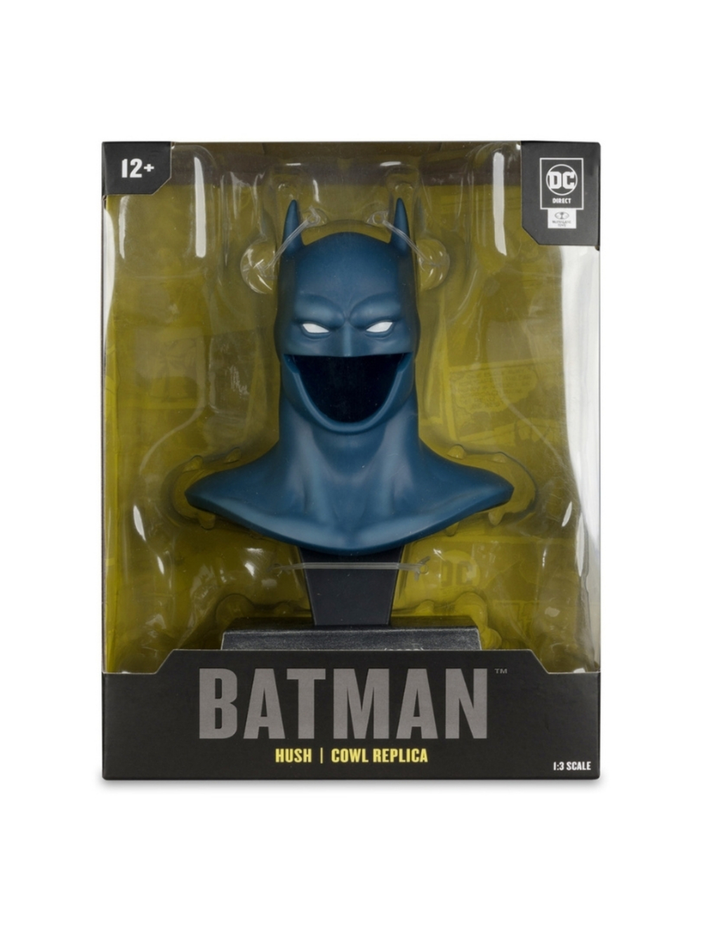 Ambalajında bir Batman Hush başlık replikası. Başlık mavi, beyaz gözlü ve açık ağızlı. Kutuda Batman logosu var.