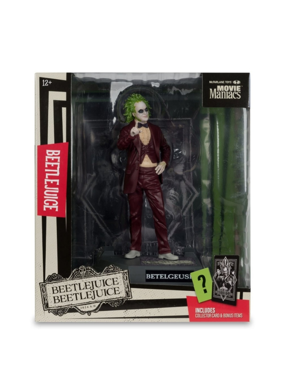 Kutuda Beetlejuice figürü. Bordo takım elbise, yeşil saçları var ve bir teşhirde. Kutuda Beetlejuice yazıyor.