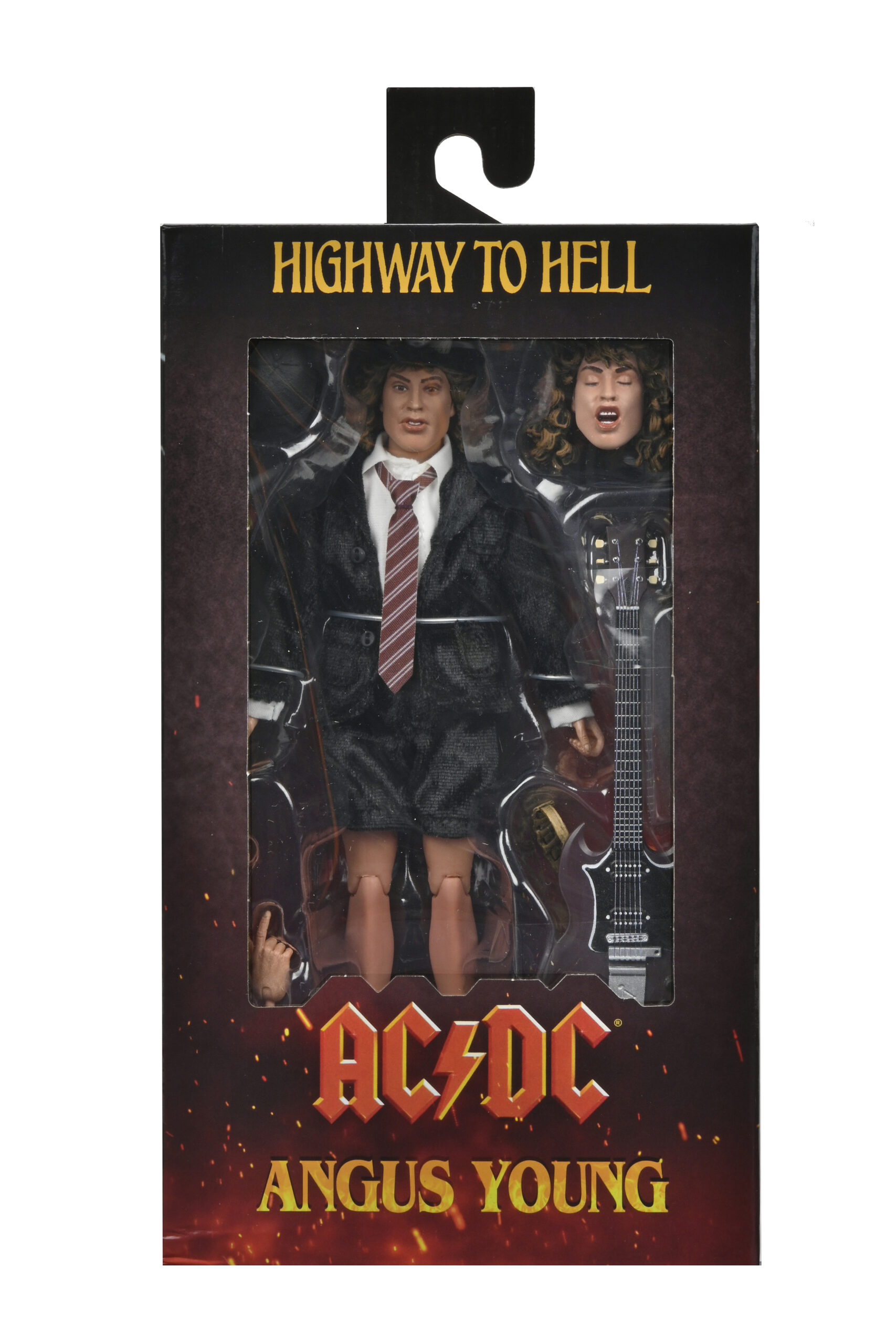 Kutuda Angus Young aksiyon figürü. Figür siyah bir takım elbise giyiyor, gitar ve başka bir kafa var.