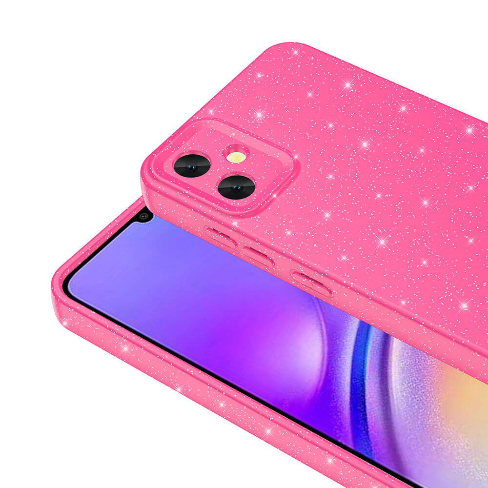 İçinde bir telefon bulunan pembe, ışıltılı bir telefon kılıfı. Kılıfın kamera boşlukları var. Telefon ekranı mor.
