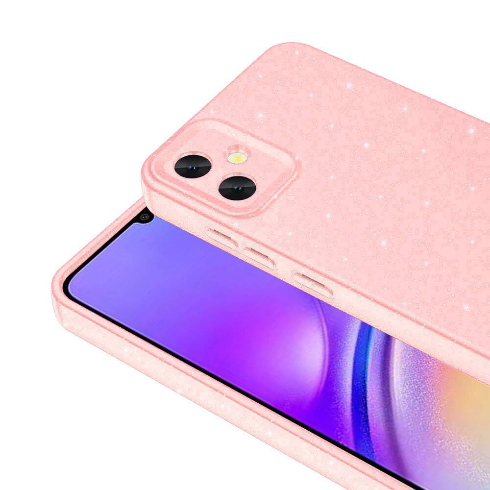 İçinde bir telefon bulunan pembe parıltılı bir telefon kılıfı. Telefon ekranı mor bir tonla görünür. Kamera lensleri görünür.