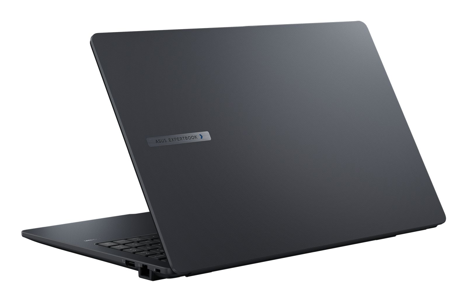 Ciemnoszary laptop ASUS ExpertBook jest lekko otwarty, odsłaniając klawiaturę. Pokrywa ma teksturowaną powierzchnię i logo.
