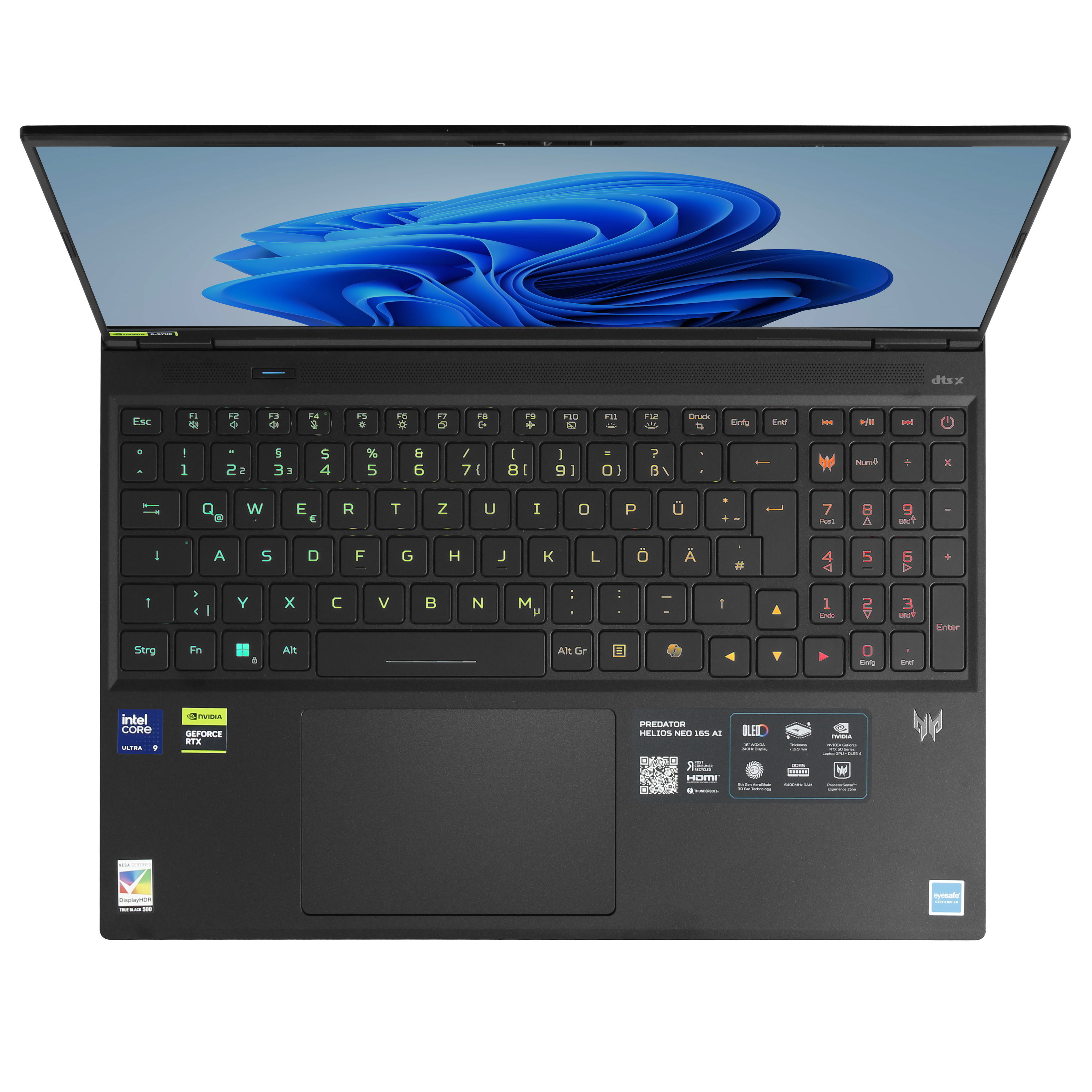 Portátil negro con teclado iluminado, pantalla con remolinos azules. Logos de Intel y Nvidia en la cubierta.