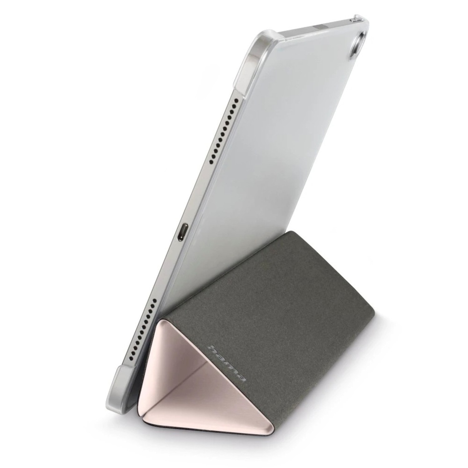 Tablet w etui jest podparty złożoną osłoną. Etui jest przezroczyste. Osłona jest szara z różowym wnętrzem.