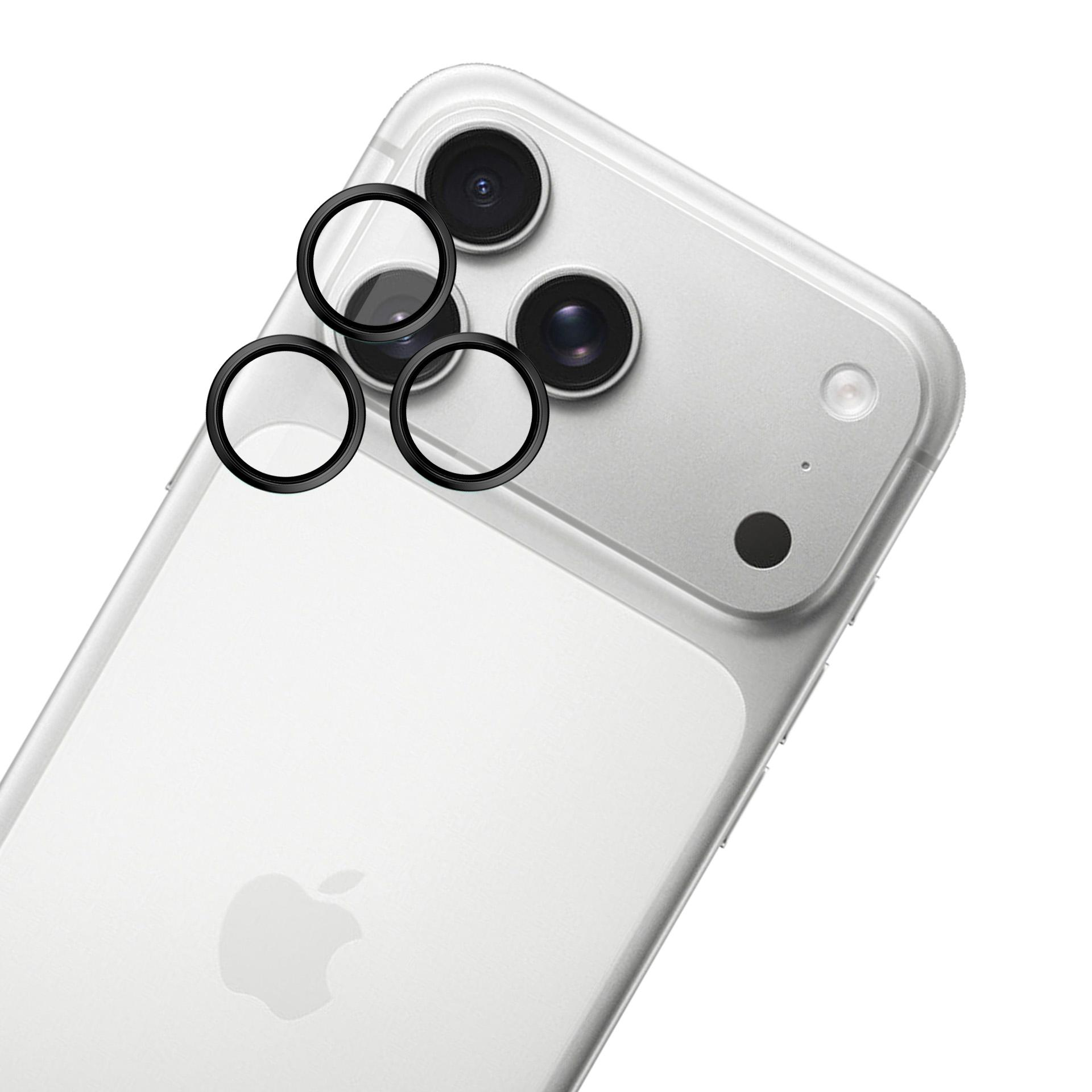 Srebrny iPhone z trzema obiektywami i pierścieniami ochronnymi. Logo Apple jest widoczne z tyłu.