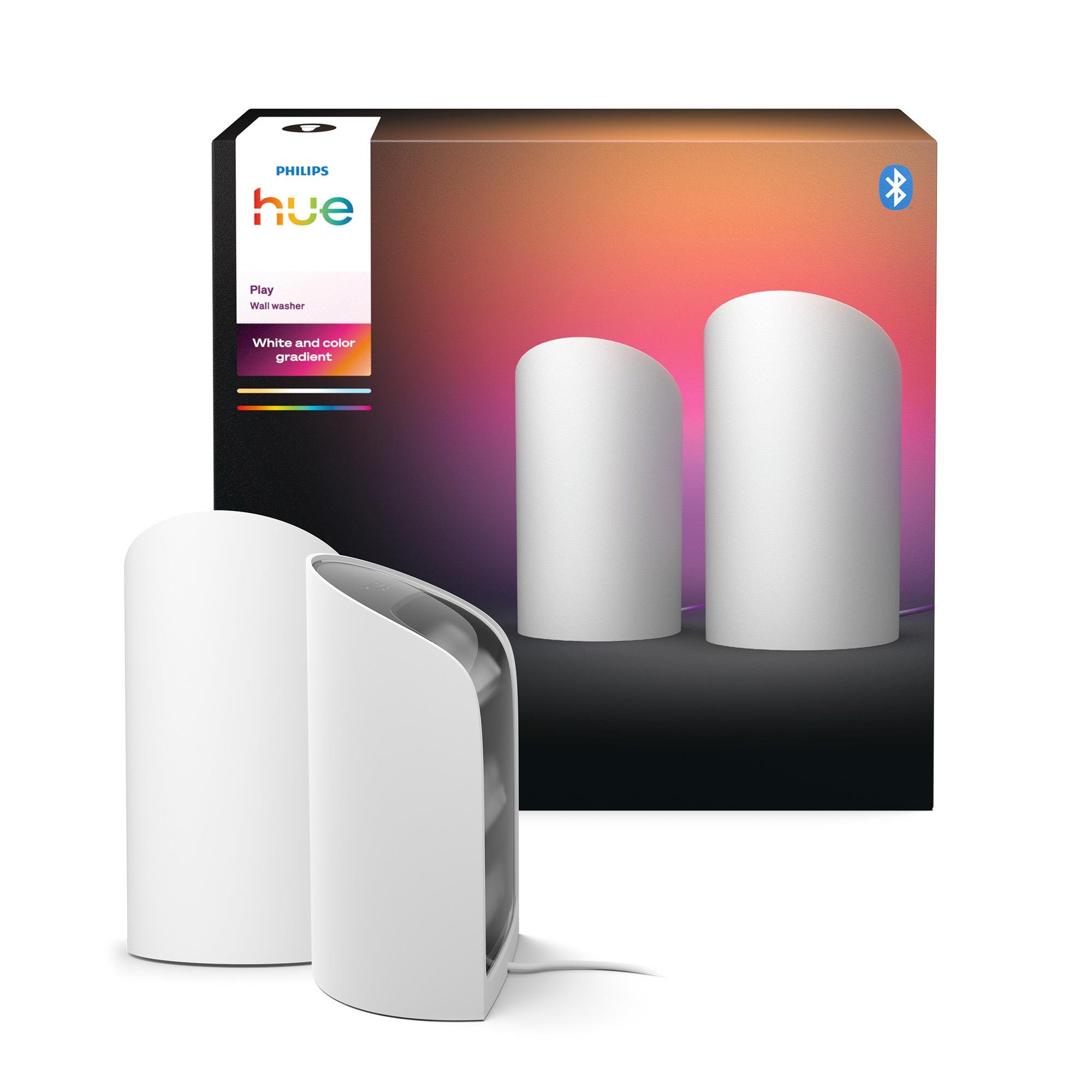Un prodotto Philips Hue Play per wall washer. Include due barre luminose bianche, una scatola con informazioni sul prodotto e un simbolo Bluetooth.