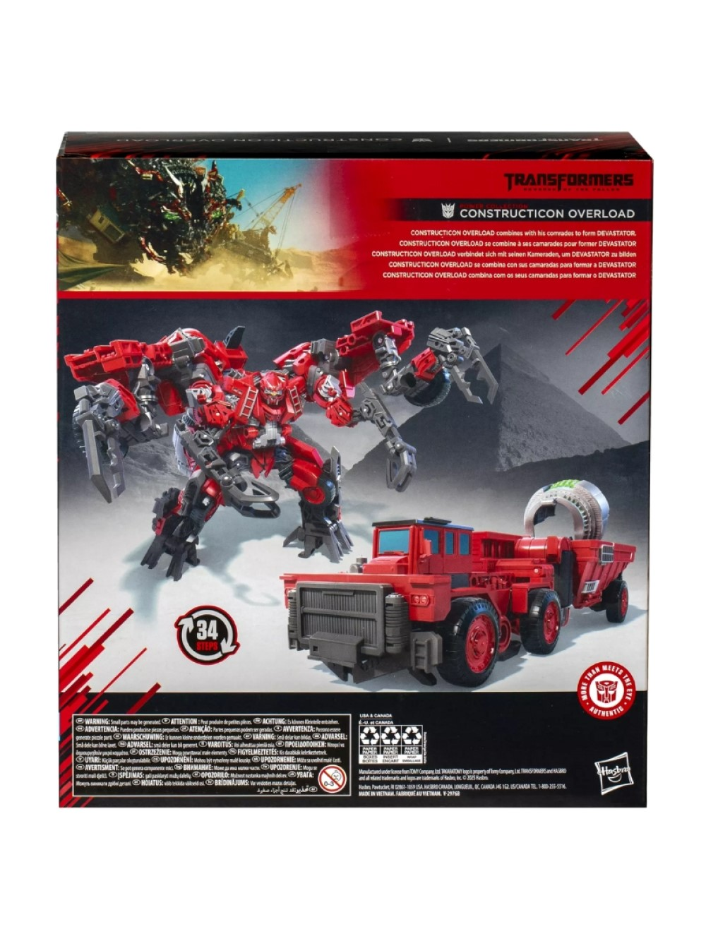 Constructicon Overload Transformer oyuncağının kutu sanatı. Kırmızı bir robot ve kamyon içerir. Metin: 'Transformers' ve uyarılar.