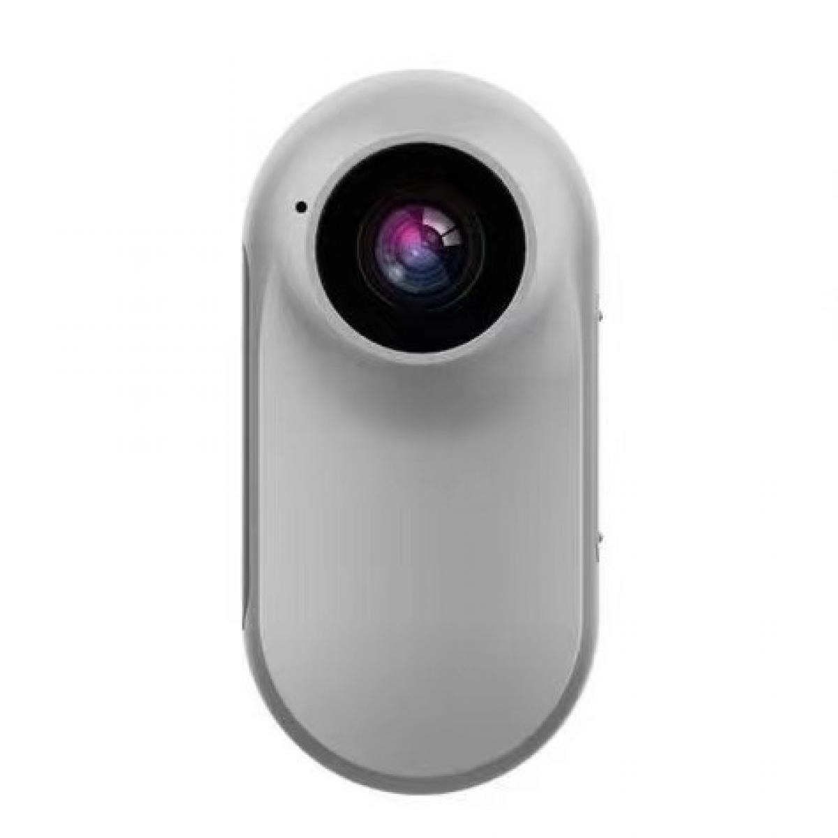 Eine graue, oval geformte Kamera mit einem großen schwarzen Objektiv. Das Objektiv reflektiert rosa und violettes Licht. Die Kamera befindet sich auf weißem Hintergrund.