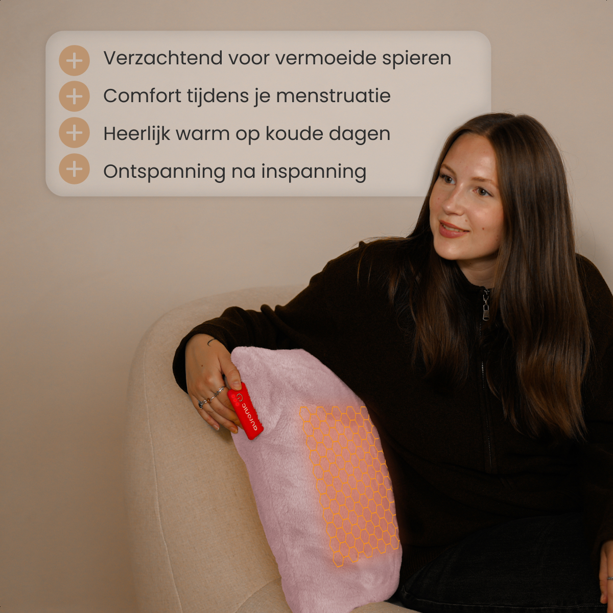 A woman sits on a beige sofa, holding a pink heating pad. Text above lists benefits: muscle relief, comfort, warmth, and relaxation.