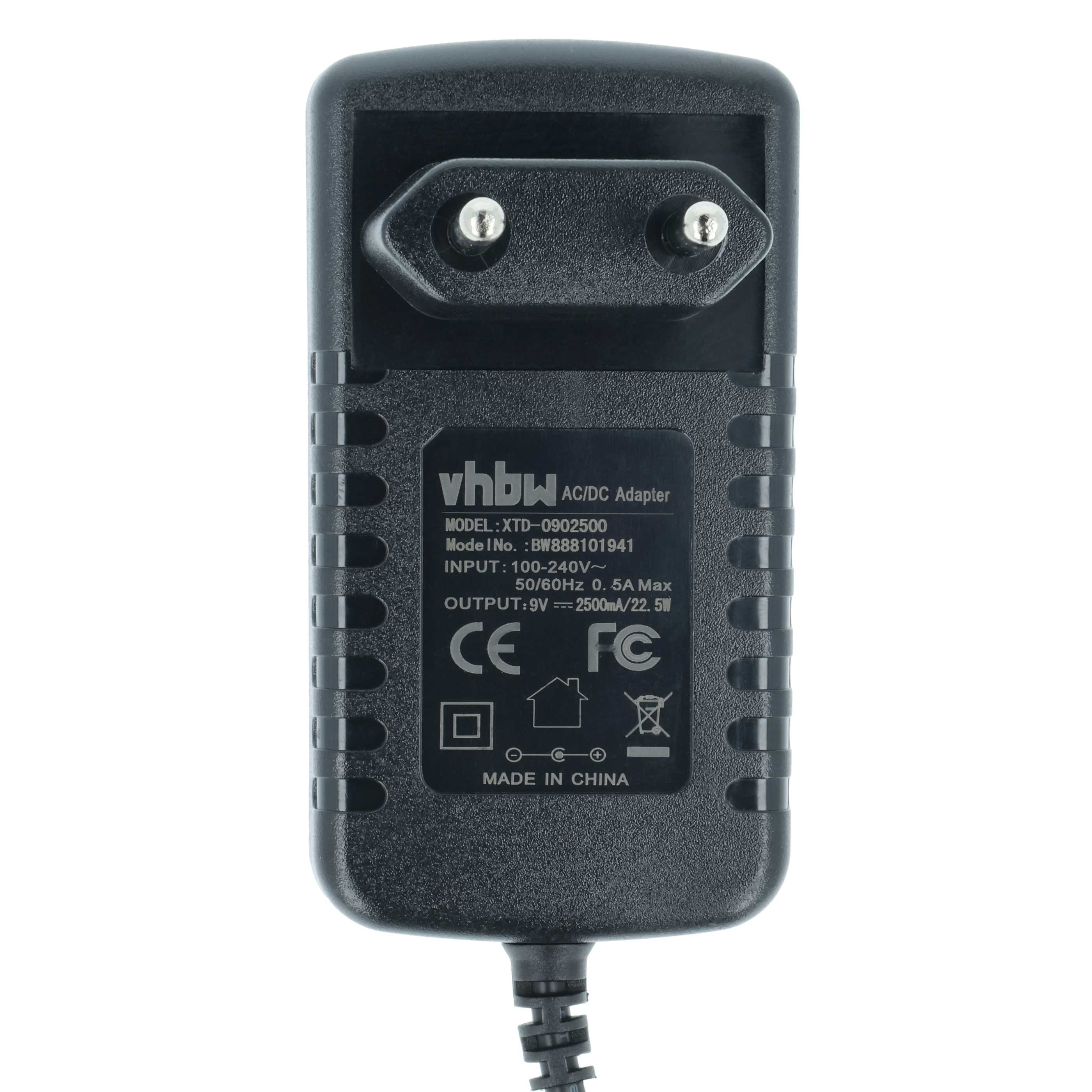 Schwarzes AC/DC-Adapter mit zwei Stiften, Textdetails und verschiedenen Symbolen. Es trägt die Aufschrift vhbw und Made in China.