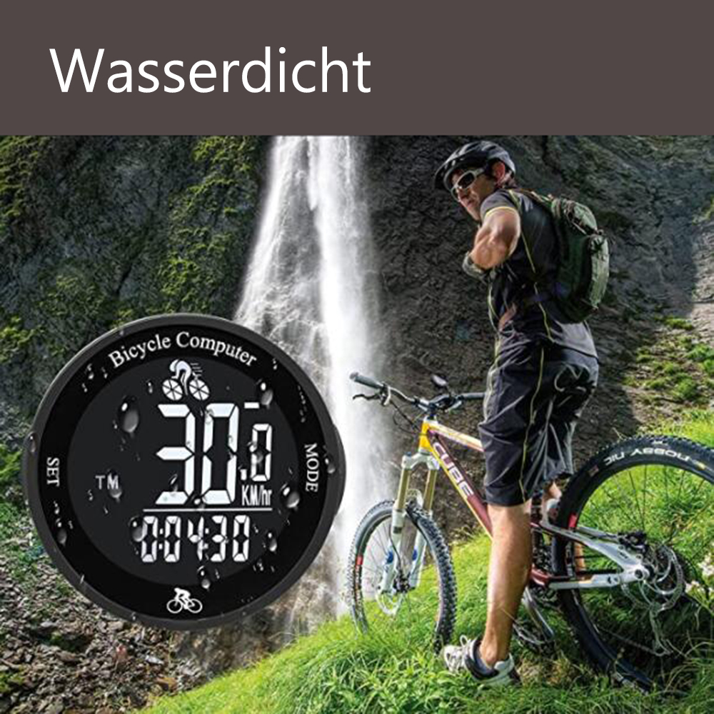 Mann auf Mountainbike in der Nähe eines Wasserfalls. Fahrradcomputer zeigt 30,0 km/h. Grünes Gras und Felsen im Vordergrund. Wasser im Hintergrund.