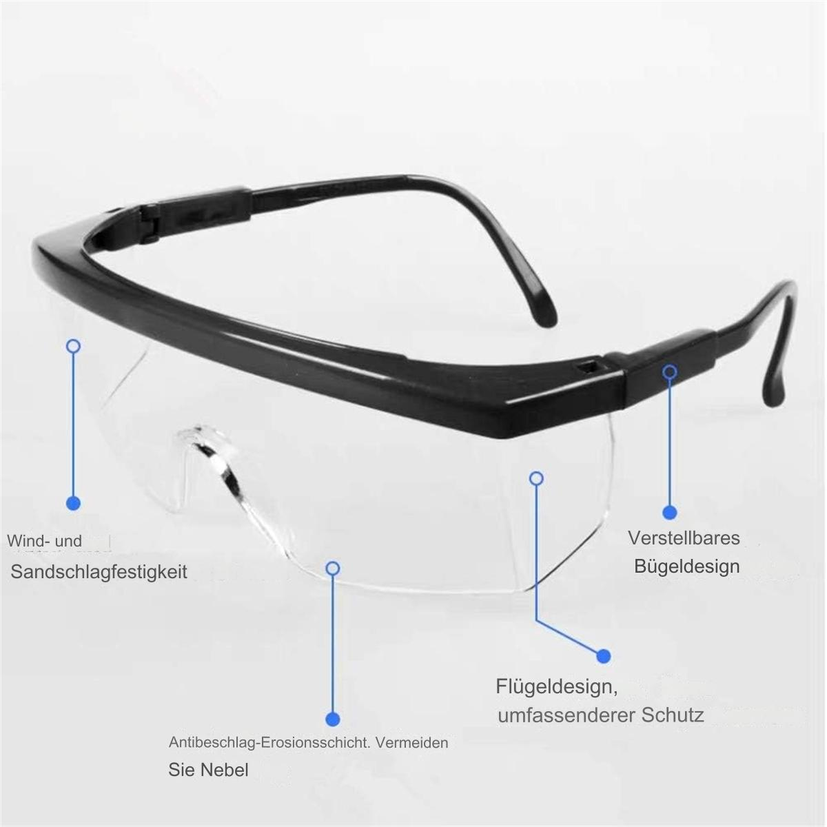 Schutzbrille mit schwarzem Rahmen und klaren Gläsern. Merkmale sind Wind- und Sand-Schutz, Antibeschlagbeschichtung und verstellbares Design.