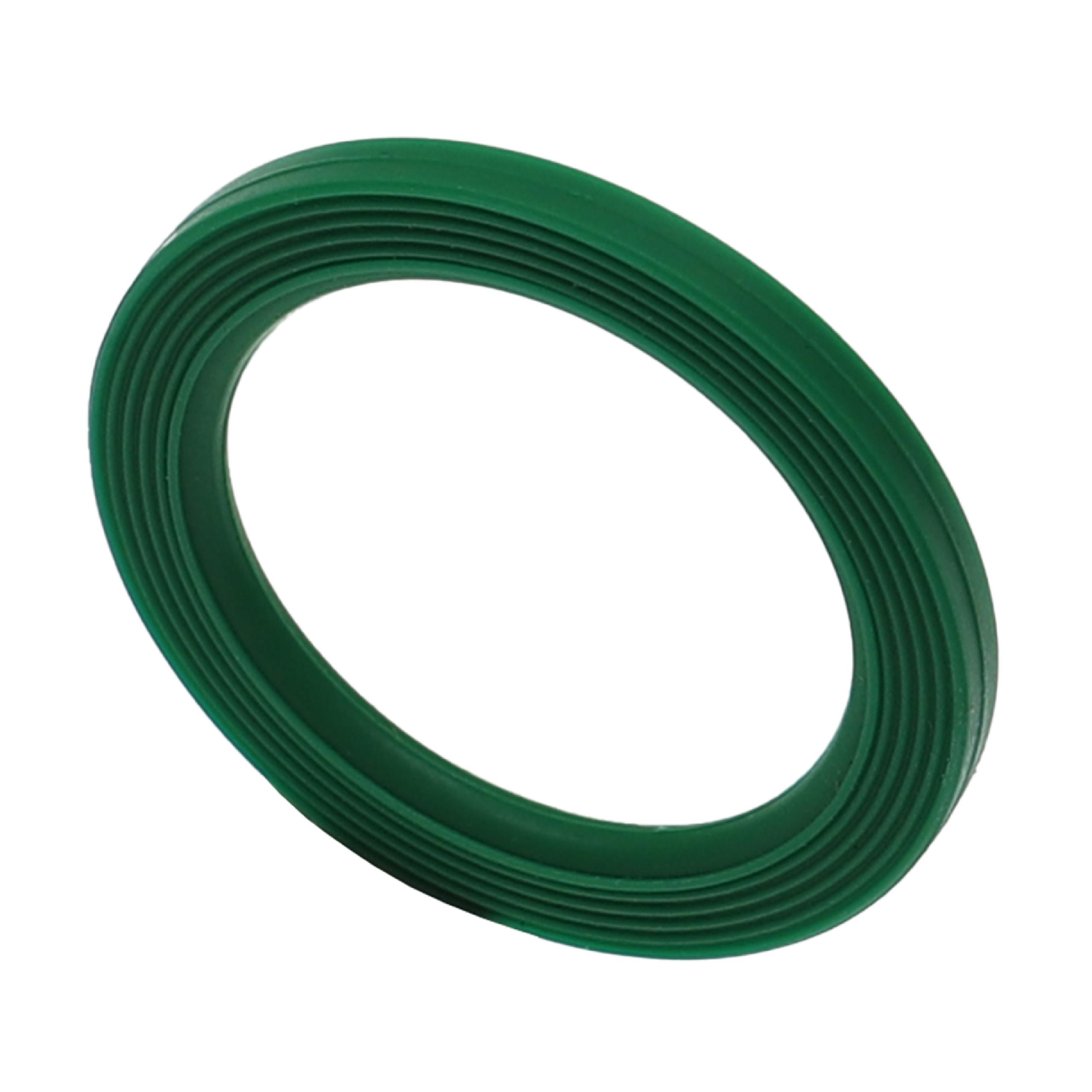 Eine grüne, kreisförmige Gummidichtung auf weißem Hintergrund. Die Dichtung hat mehrere konzentrische Rippen.