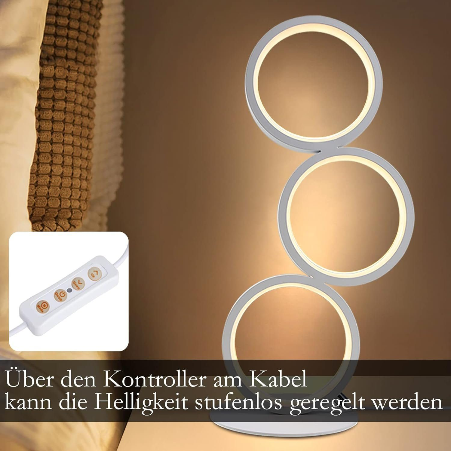 Una lampada moderna con tre luci collegate a forma di anello. Un pannello di controllo bianco con pulsanti è nell'immagine. Testo in tedesco in basso.