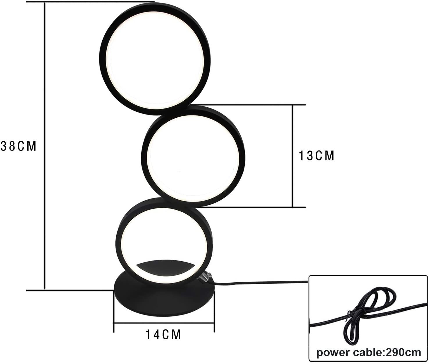 Una lampada nera con tre luci circolari. Dimensioni: 38 cm altezza, 13 cm larghezza, 14 cm base. Cavo di alimentazione: 290 cm.