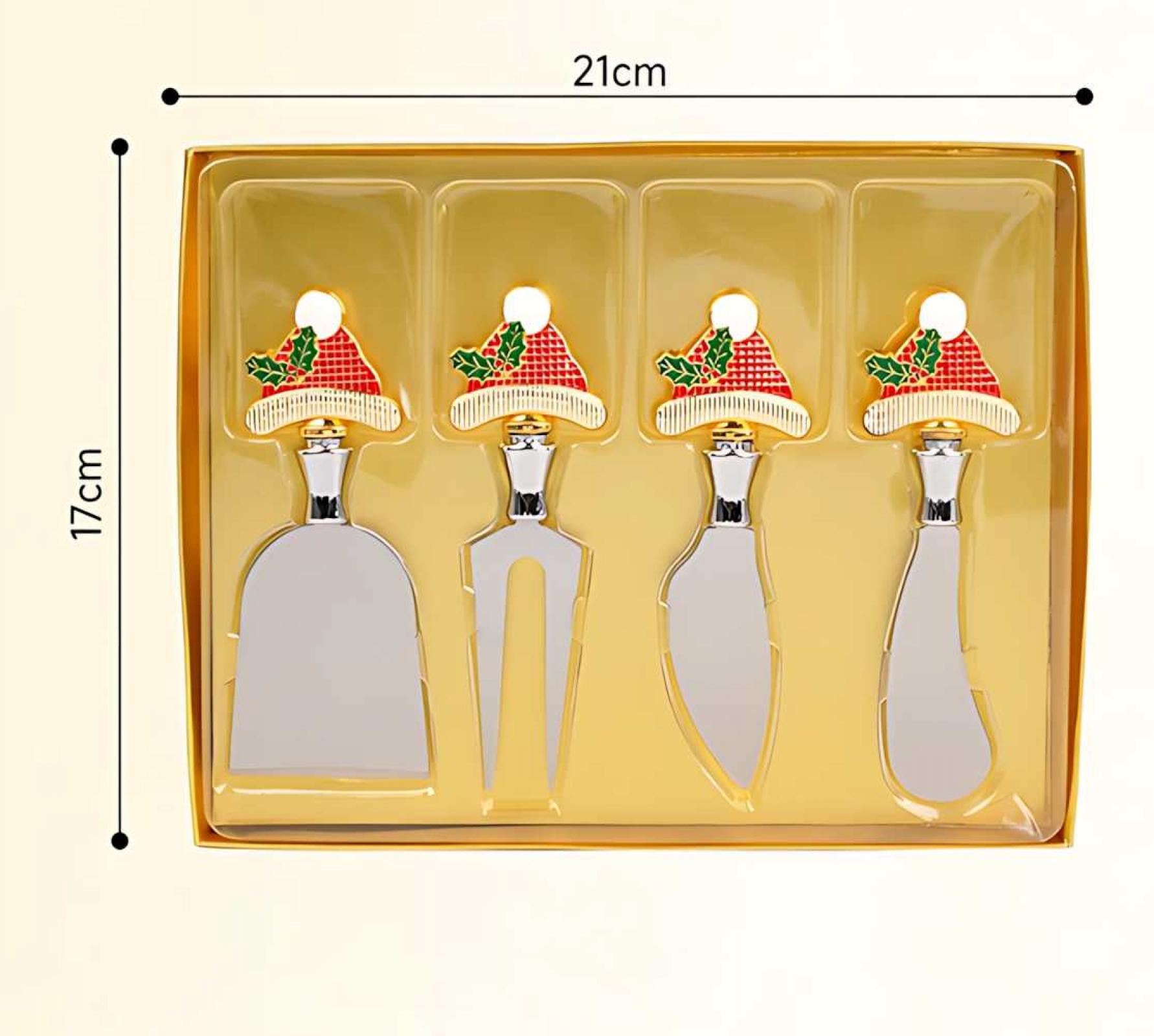 Käsemesser-Set in einer Goldbox. Jedes Messer hat ein rotes Weihnachtsmützen-Design am Griff.