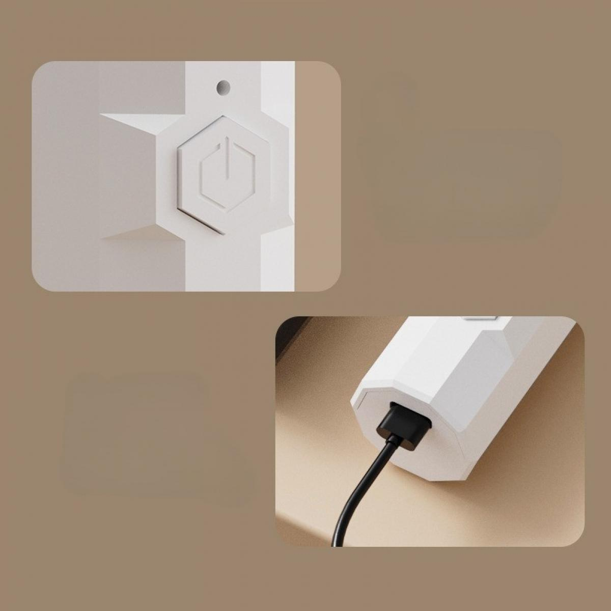Zwei weiße Geräte mit geometrischen Designs. Eines hat einen Power-Button, das andere ein angeschlossenes schwarzes Kabel.