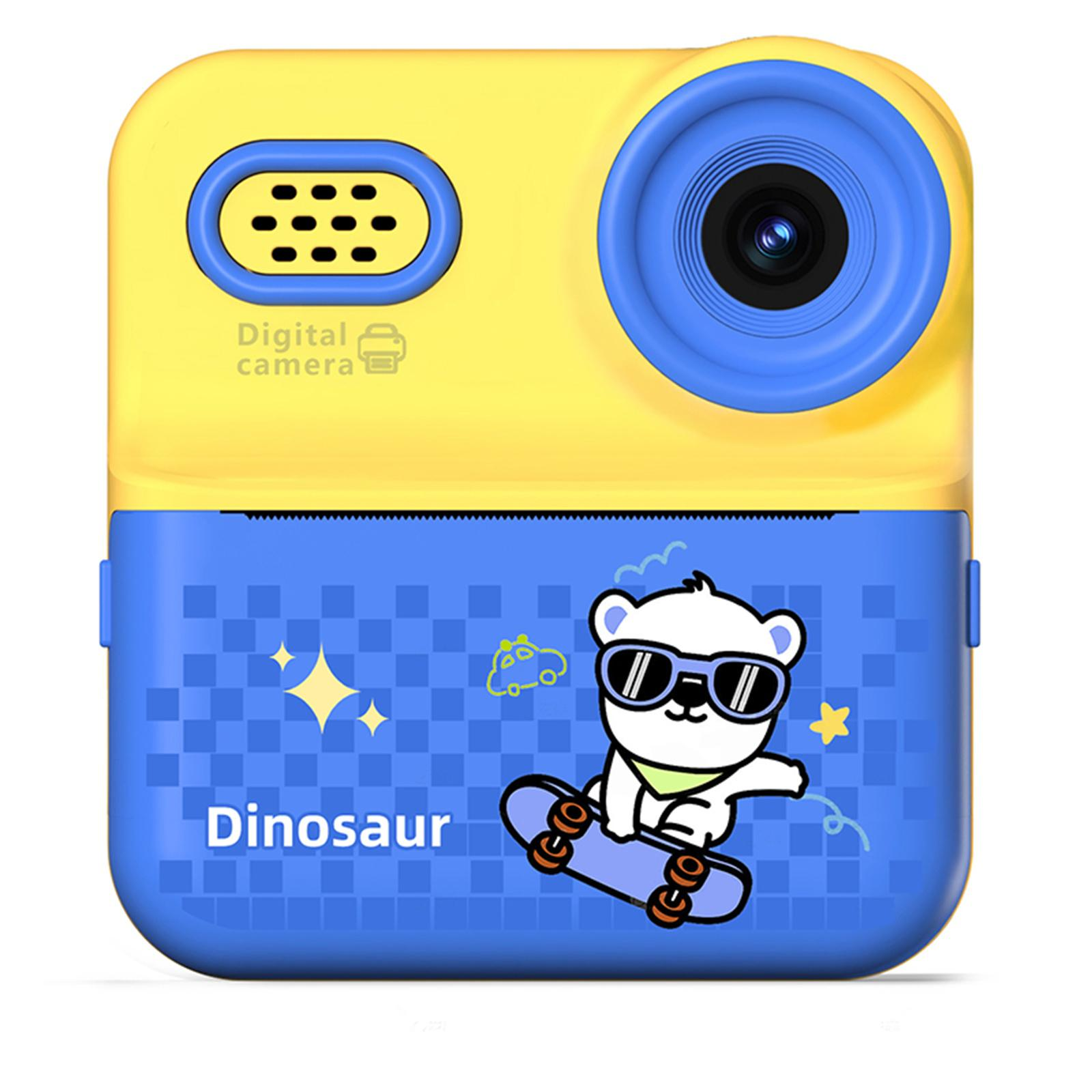Eine gelbe und blaue Digitalkamera. Auf der Vorderseite ist ein Cartoon-Bär auf einem Skateboard.