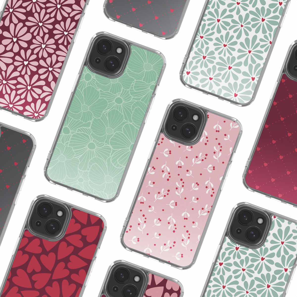 Various phone cases with floral and heart patterns in shades of pink, green, and red, against a white background.