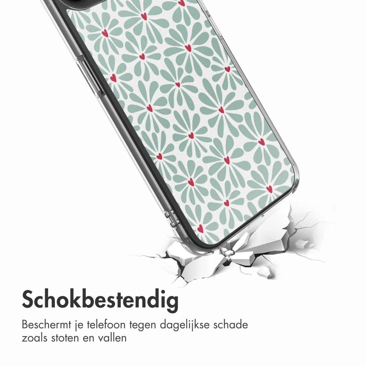 Coque de téléphone à motif floral tombant sur un sol fissuré. Fleurs vert clair avec cœurs rouges. Texte : 'Schokbestendig'.