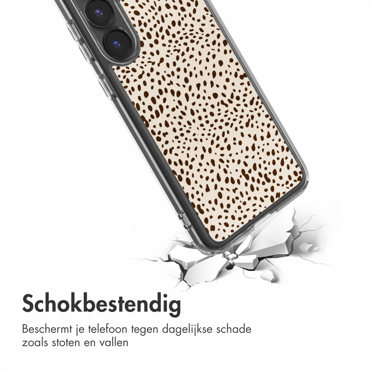 Telefoonhoesje met bruine stippen. Het valt en raakt een wit oppervlak, dat barst. Tekst eronder: 'Schokbestendig'.