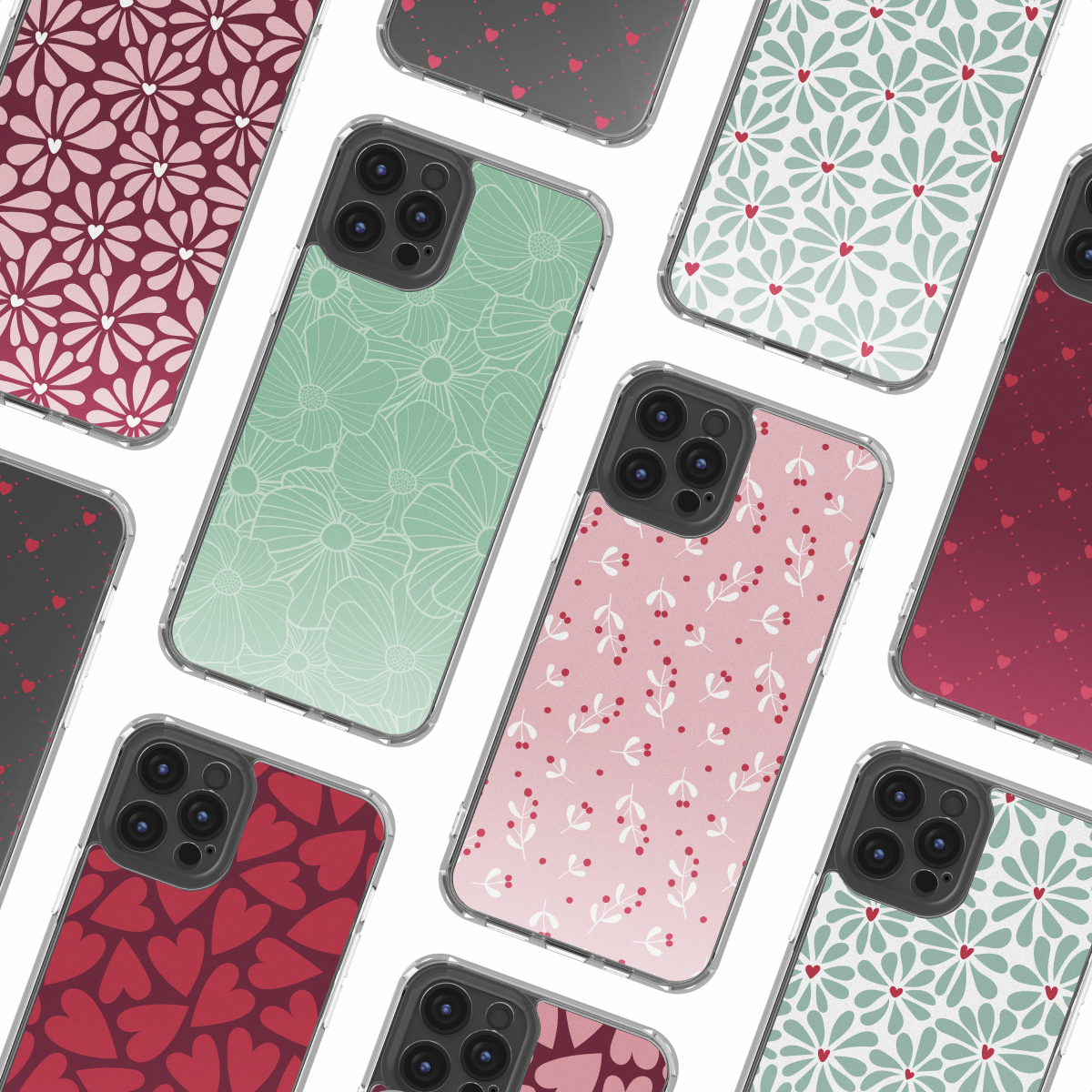 Meerdere telefoonhoesjes met diverse bloemen-, hart- en bessenpatronen. De hoesjes zijn in tinten roze, groen en rood, met witte achtergronden.
