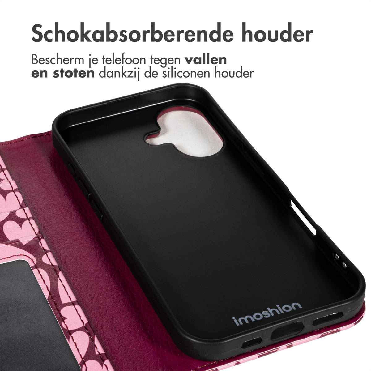 Een zwarte telefoonhoes met imoshion-logo is open, en toont een roze interieur met hartenpatroon. Tekst in het Nederlands.